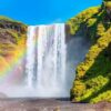 Photographic Print: Icelandic Landscape Concept – View of Famous Skogafoss Waterfall and Amazing Rainbow by murat4art: 12x8in